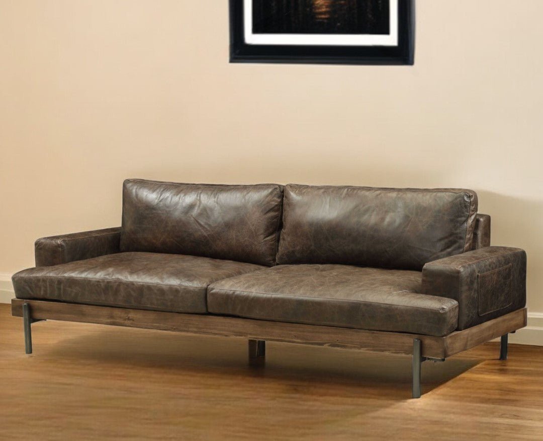 comstock-leather-sofa-chocolate-3730067.jpg Comstock Leather Sofa – Chocolate - Image 1