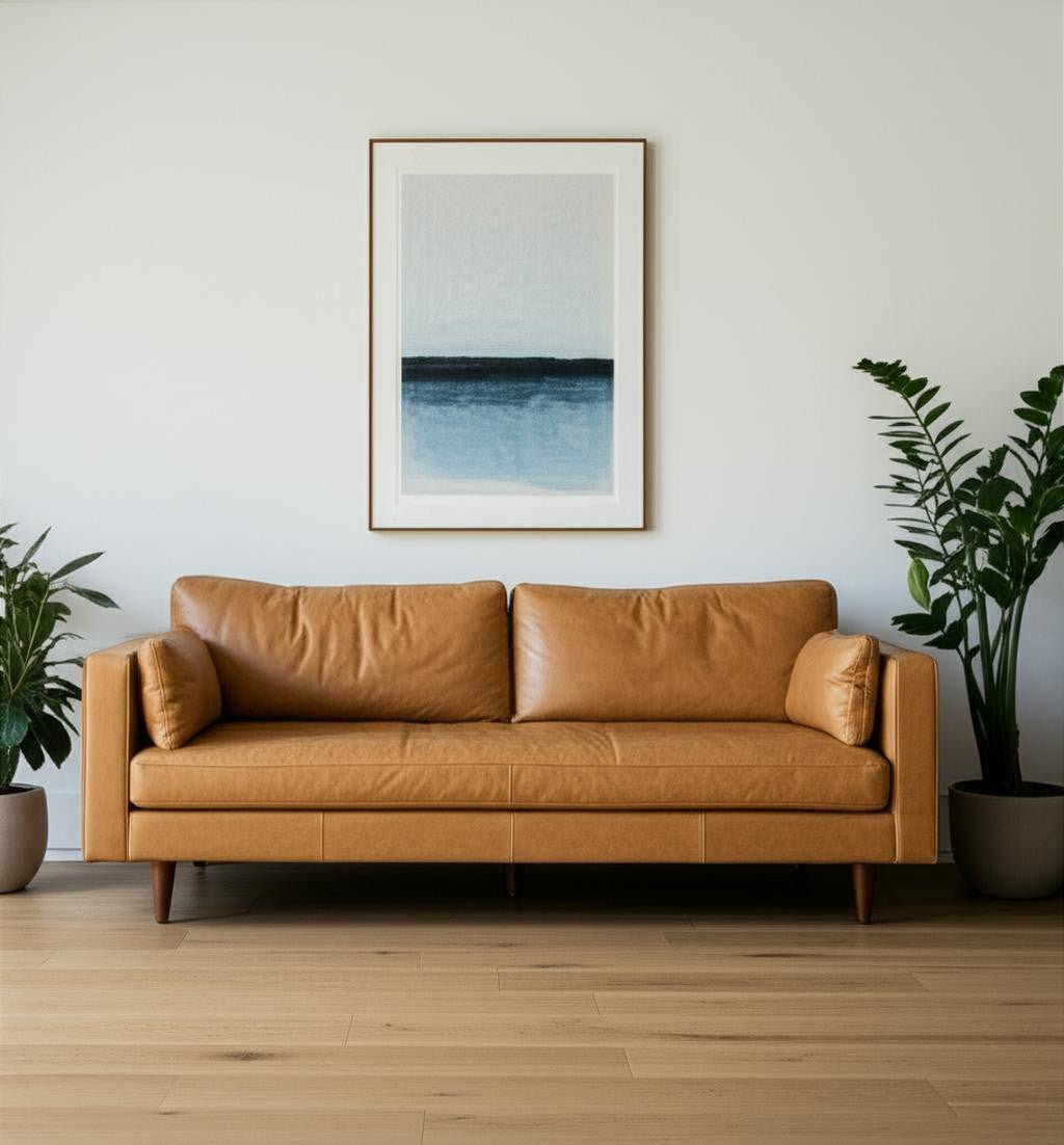 the-edisto-tan-leather-sofa-with-toss-pillows-9790211.jpg The Edisto – Tan Leather Sofa with Toss Pillows - Image 1
